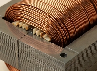 Copper winding around a laminated magnetic core